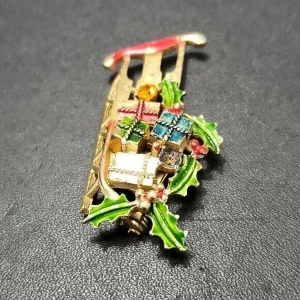 Vintage Weiss holiday sled brooch gold tone red green